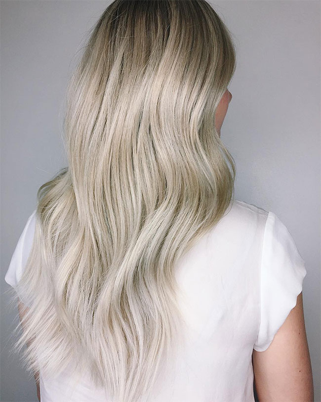 Vanilla blonde haircolor with darker shadow root by Chris Weber Hair