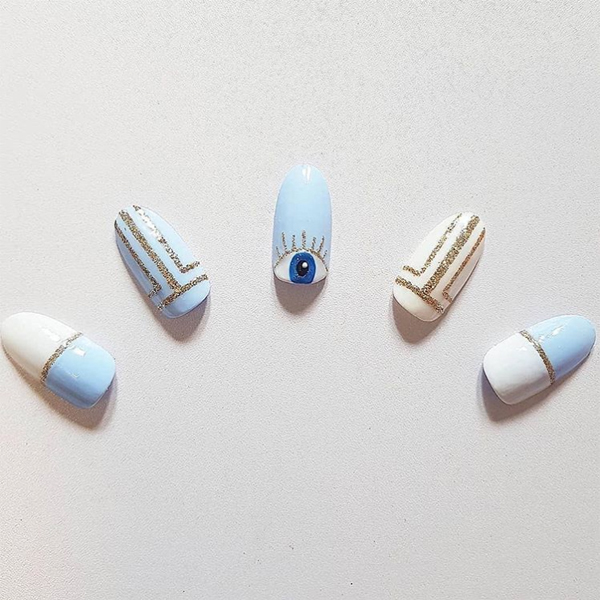 winter nail art cnd shellac luxe creekside evil eye nail art