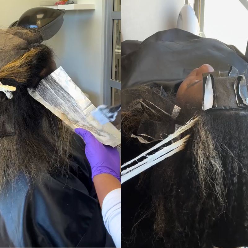 Face-framing blonde highlights adding brightness and contrast to long dark hair.