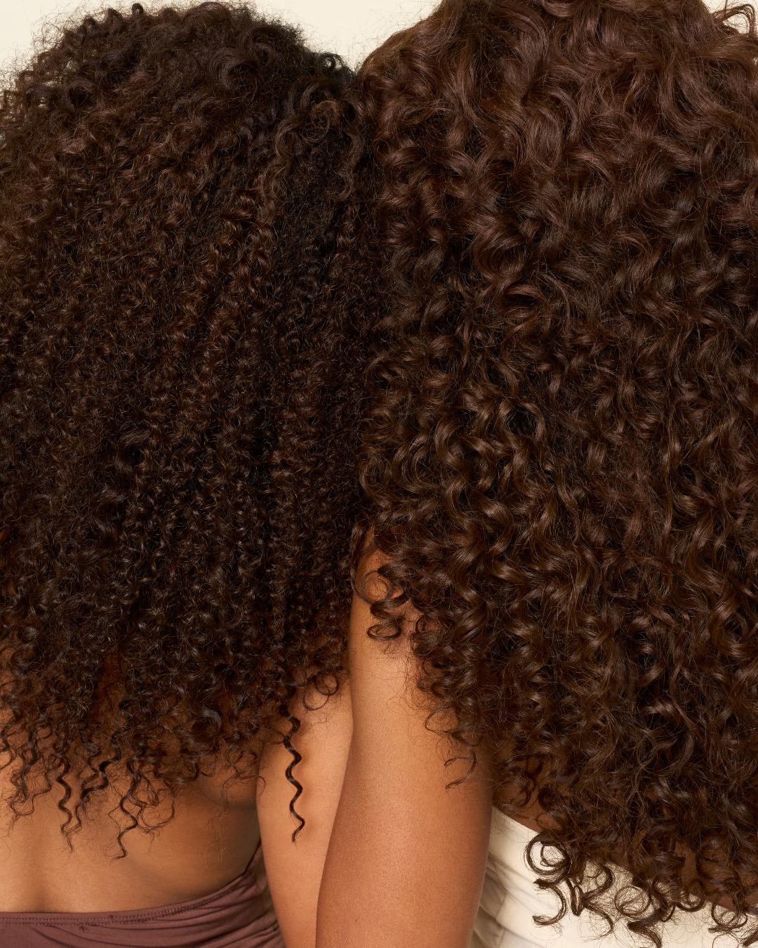 Side-by-side comparison of Loose Spiral and Deep Spiral curl patterns from The Hair Shop Curly Collection