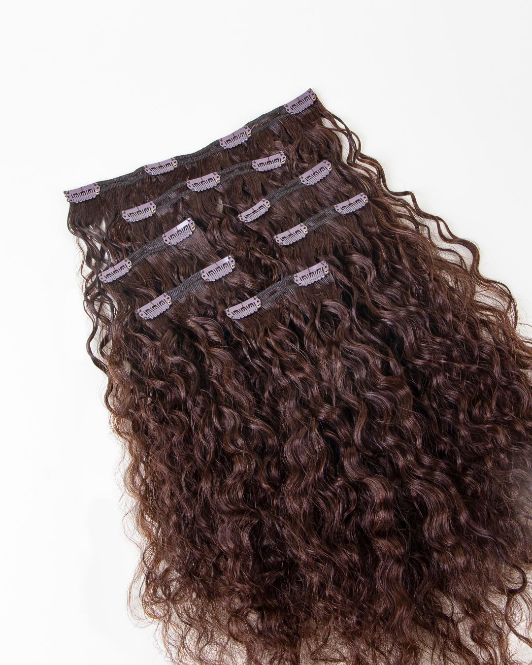 Loose Spiral Pro 7 Clip-In extensions featuring elongated 3A to 3B curl pattern