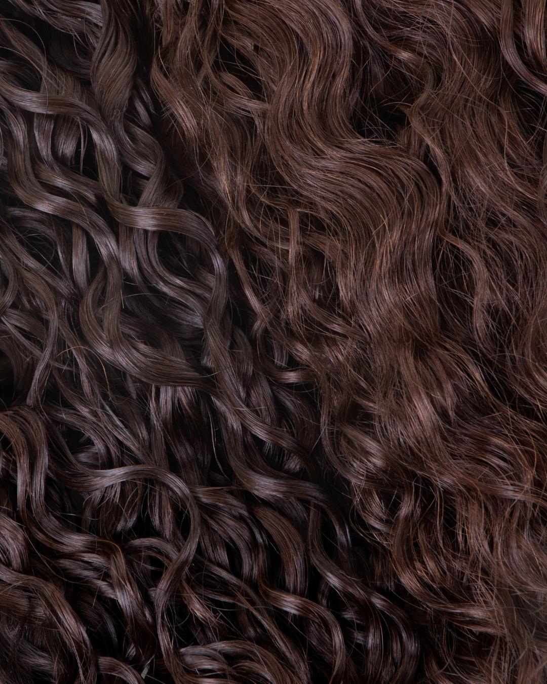 Close-up comparison of Loose Spiral curl definition and texture pattern