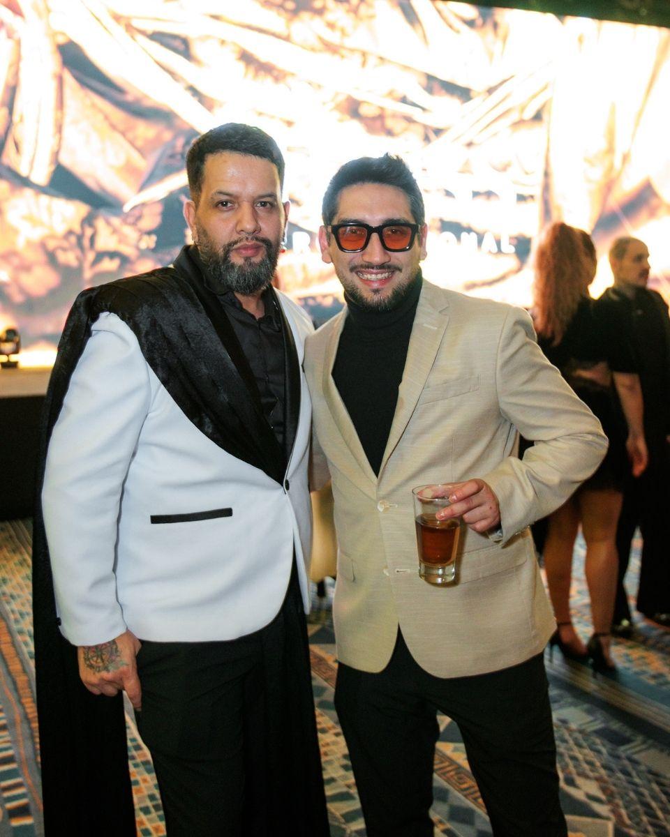 Guests pose together in formal attire during the TRUSS Professional black-tie gala.