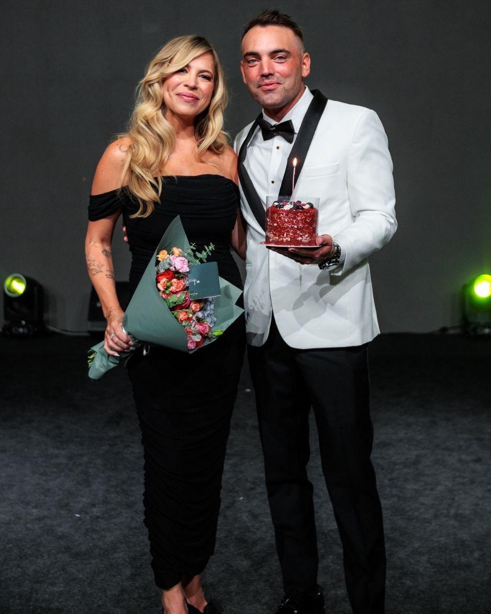 TRUSS Global Ambassador Mickey Colón and his wife, Kristen, pose together during the black-tie gala after Kristen was surprised with a birthday celebration.