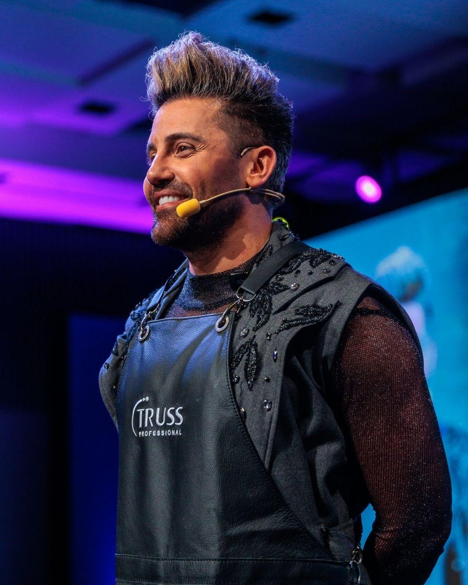 TRUSS Global Ambassador Gabriel Samra presents onstage during a live education class.
