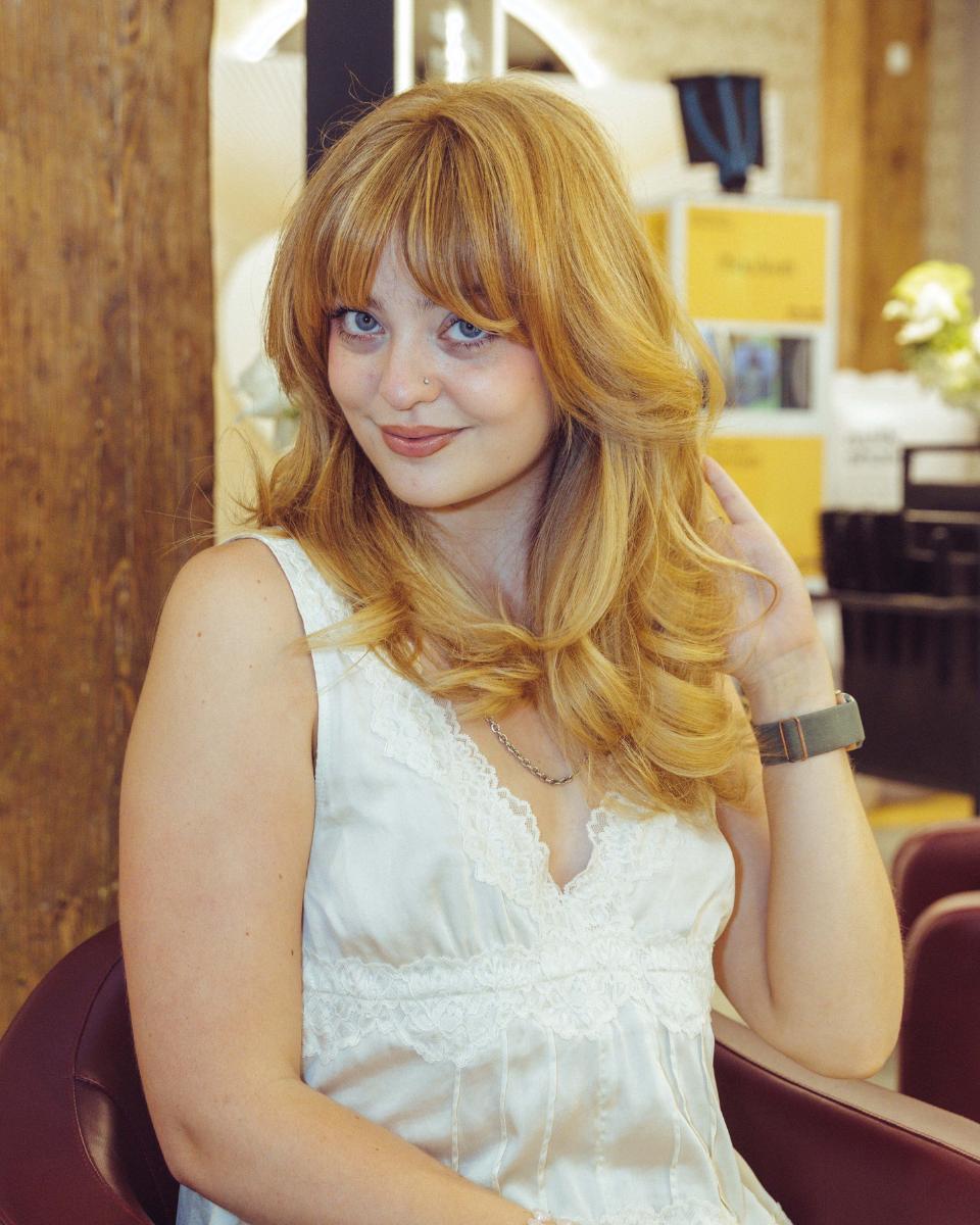 Lauren Freas shows her finished golden blonde style after the milk_shake Everlasting Bonds treatment.