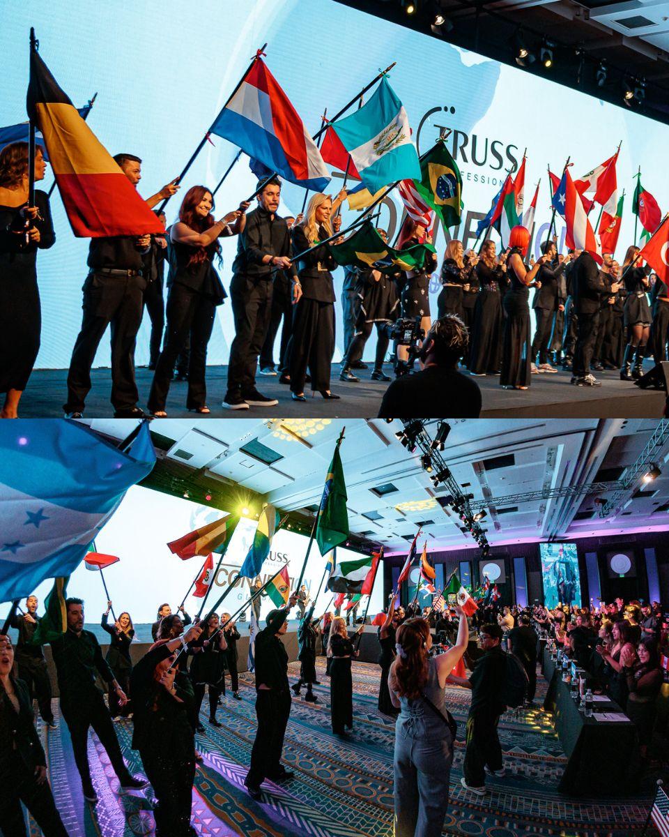TRUSS artists and attendees wave flags from multiple countries on stage and throughout the audience during TRUSS Connection Global in Lima, Peru.