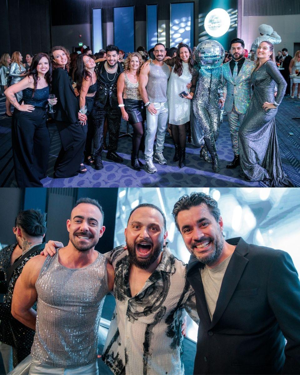 TRUSS Professional team members and ambassadors pose together during a silver-themed event party, including Andy Macedo, Asil and Luis Alfredo.