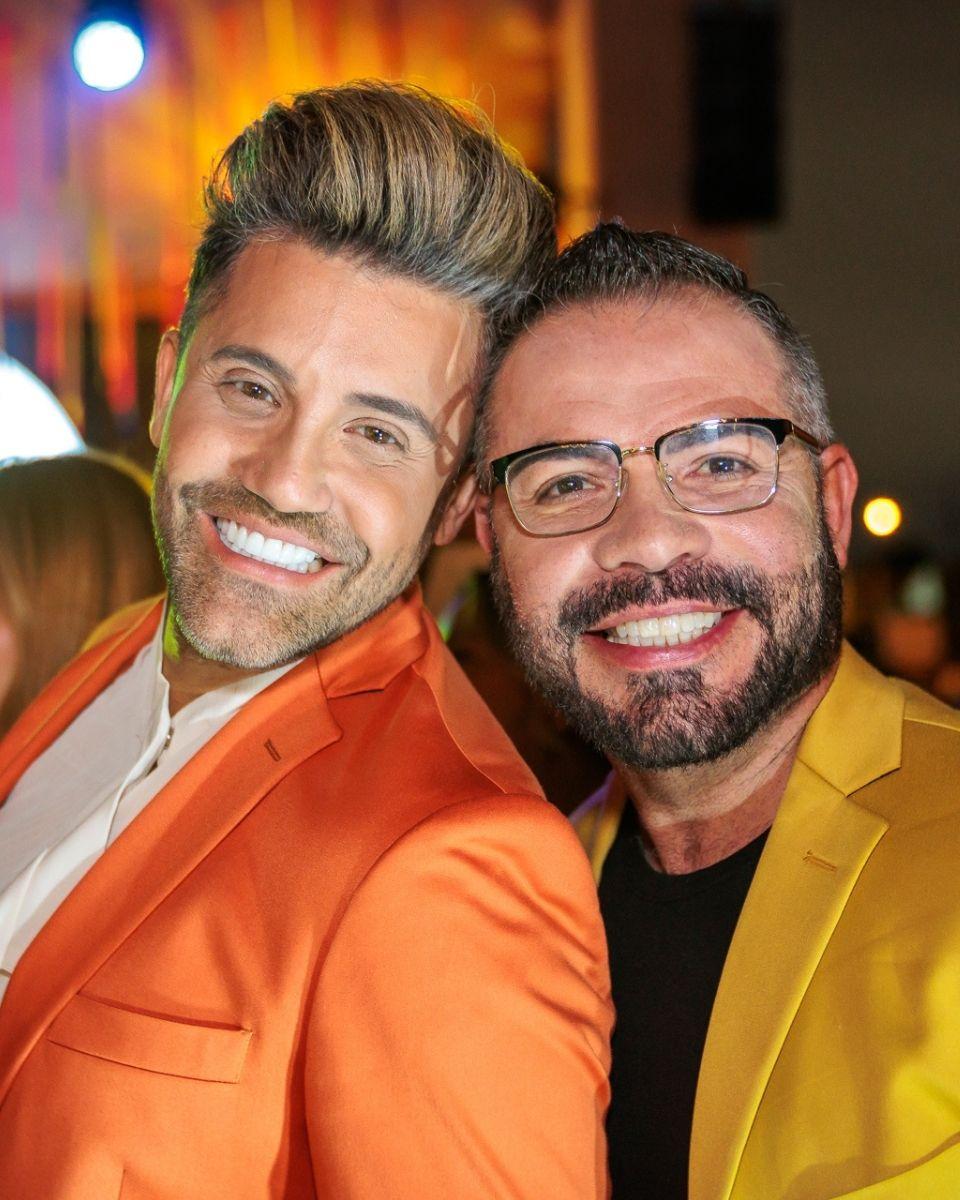 Gabriel Samra and his husband, Issac, smile together during an evening TRUSS Professional celebration in Lima, Peru.