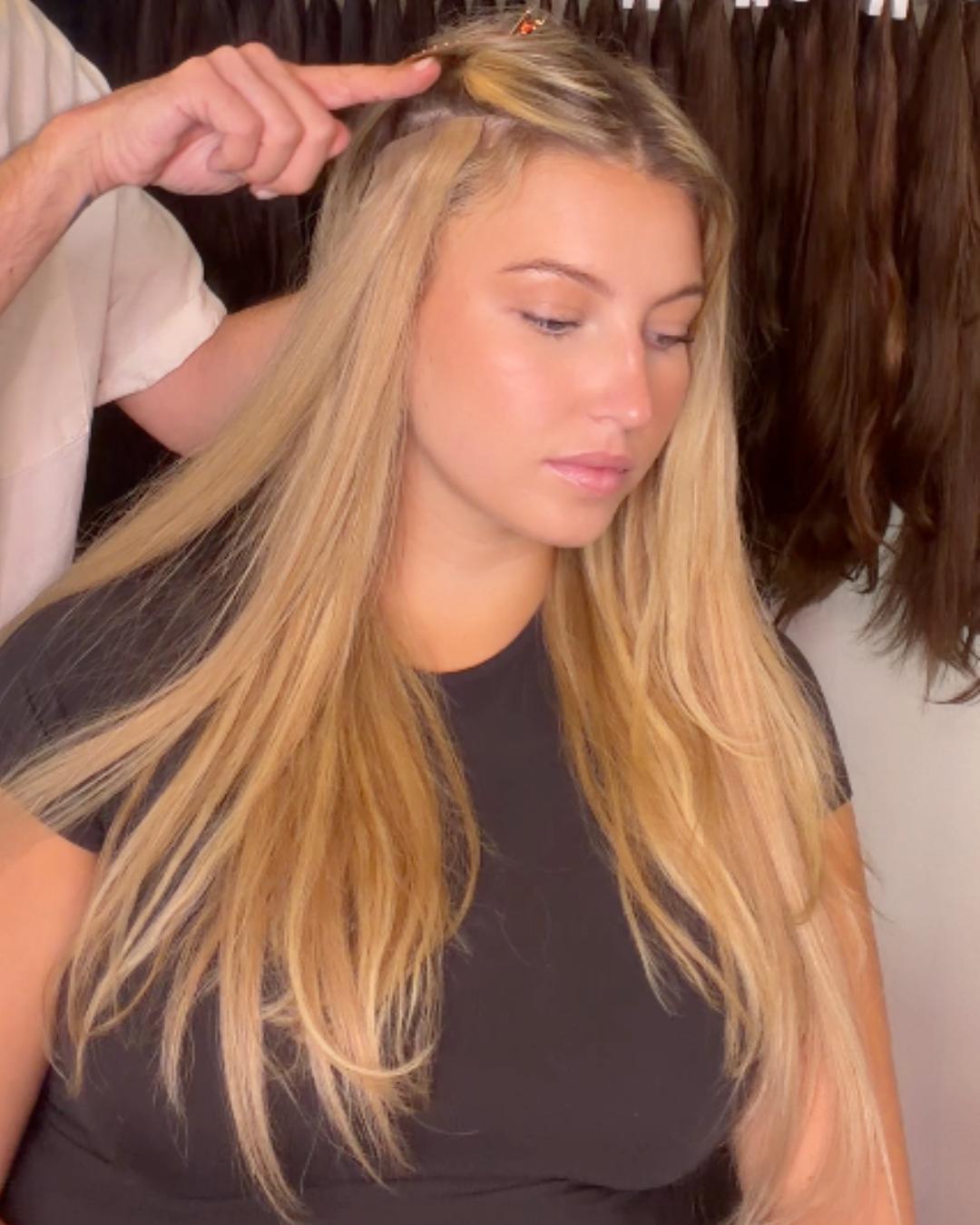 donna bella clip in on a client with blonde hair Photo courtesy of Donna Bella
