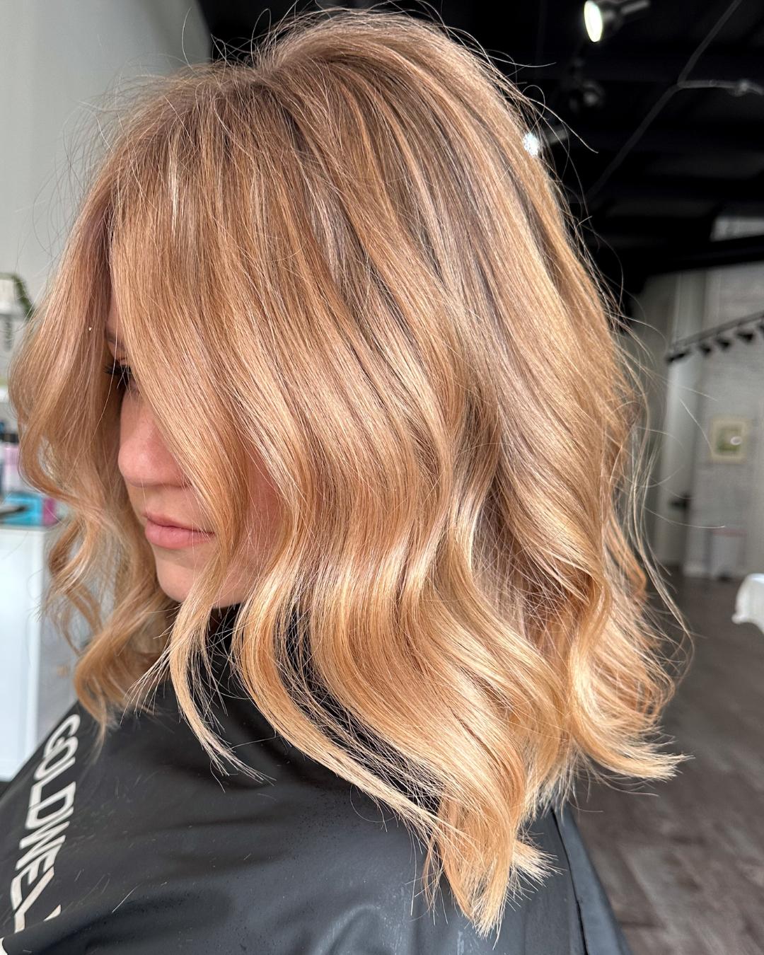 strawberry beige lob side view Photo Credit Instagram via @andreamichelehair