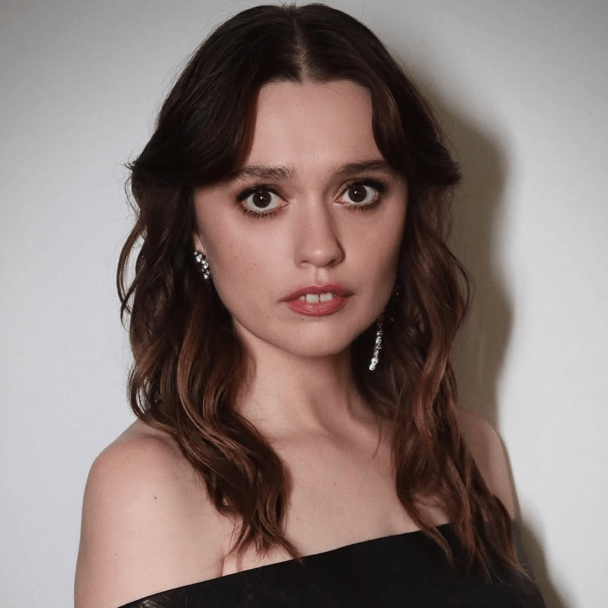 Aimee Lou Wood's glossy brunette transformation with soft, lived-in depth and subtle tonal blends