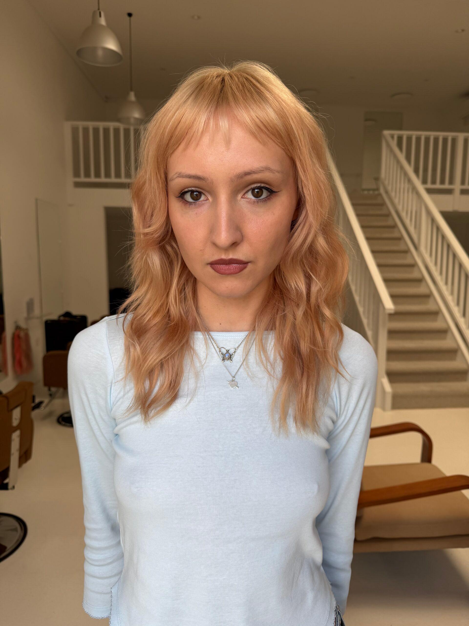 A soft pastel pink foundation provides the perfect canvas for dimensional color placement.