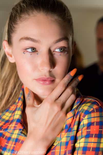 Jeremy Scott SS18 
Hair by Eugene Souleiman for Wella Professionals
Nails by Miss Pop for CND 