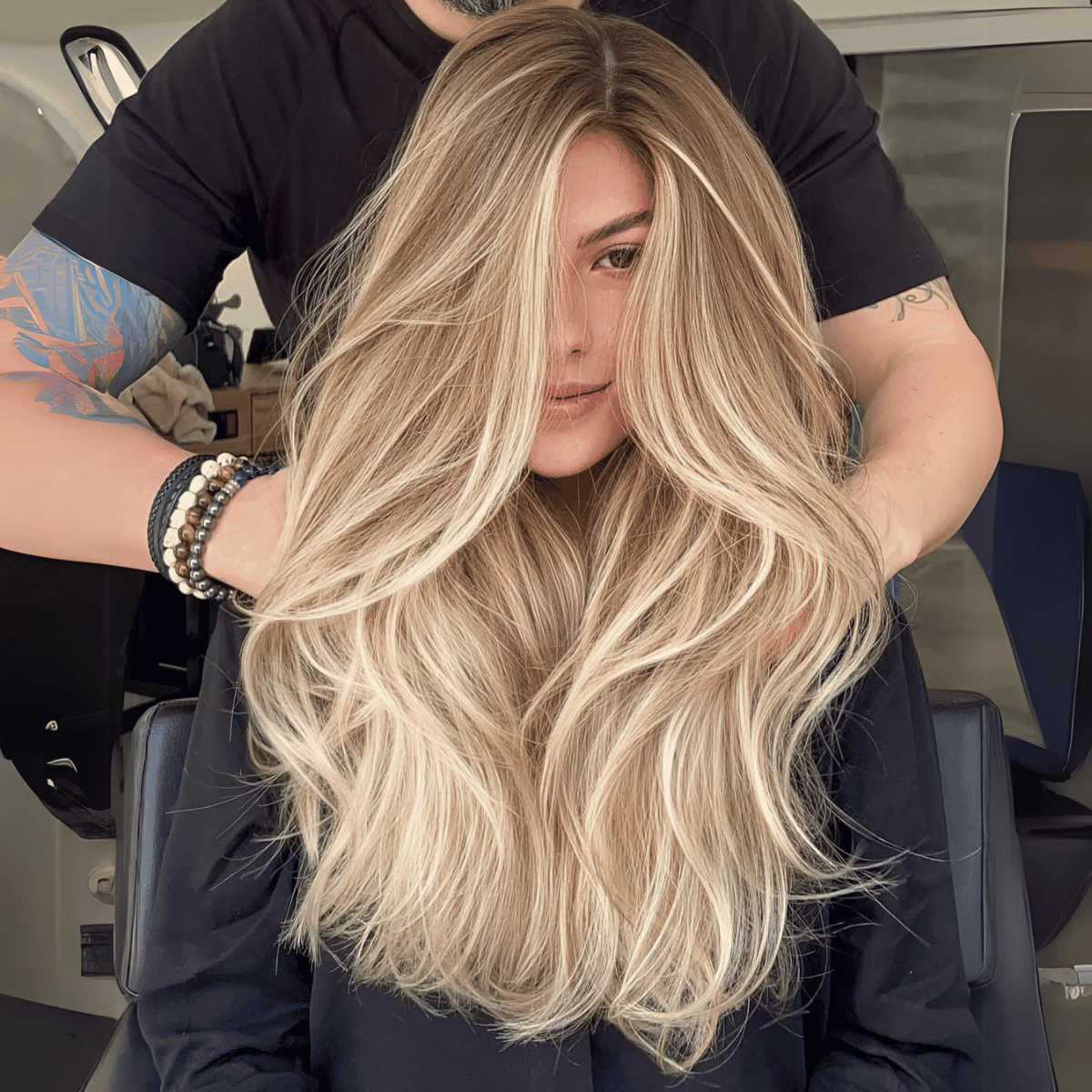 Full, lived-in butter blonde with warm undertones and seamless extension blend