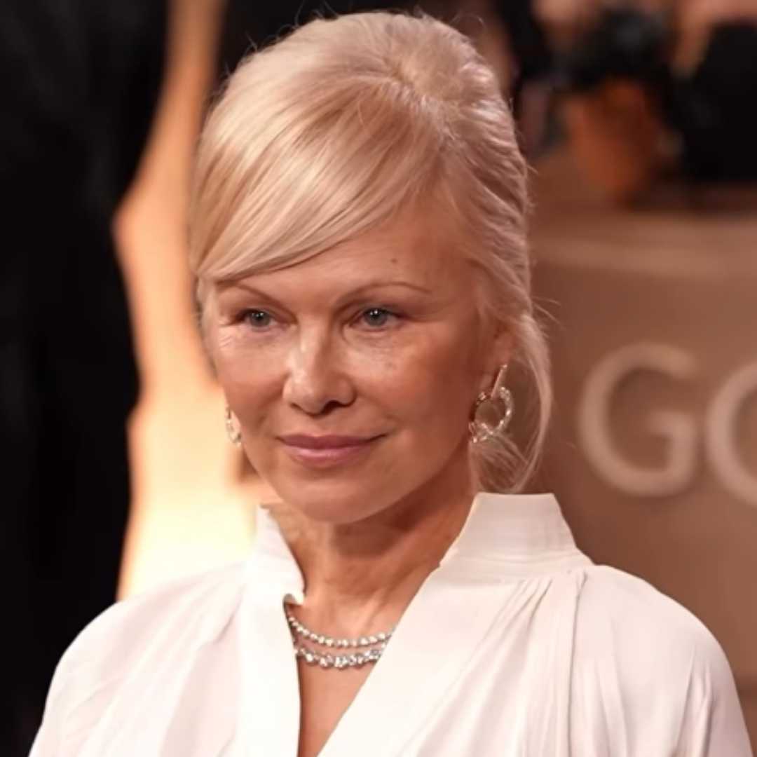 Pam Anderson platinum french twist front view red carpet