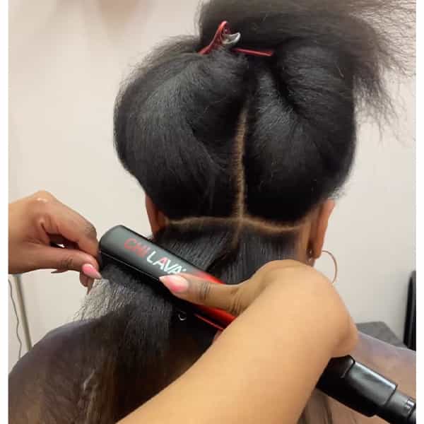 silk press blowout on textured hair curly to straight tips healthy