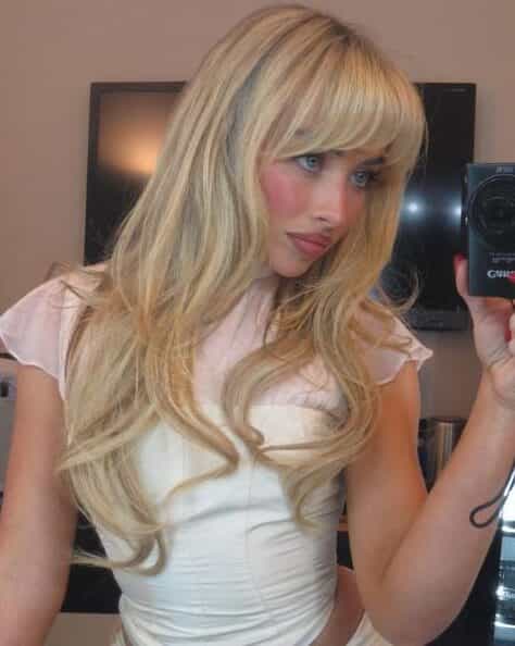 How to cut and color sabrina carpenter's hair golden blonde curtain bangs fringe