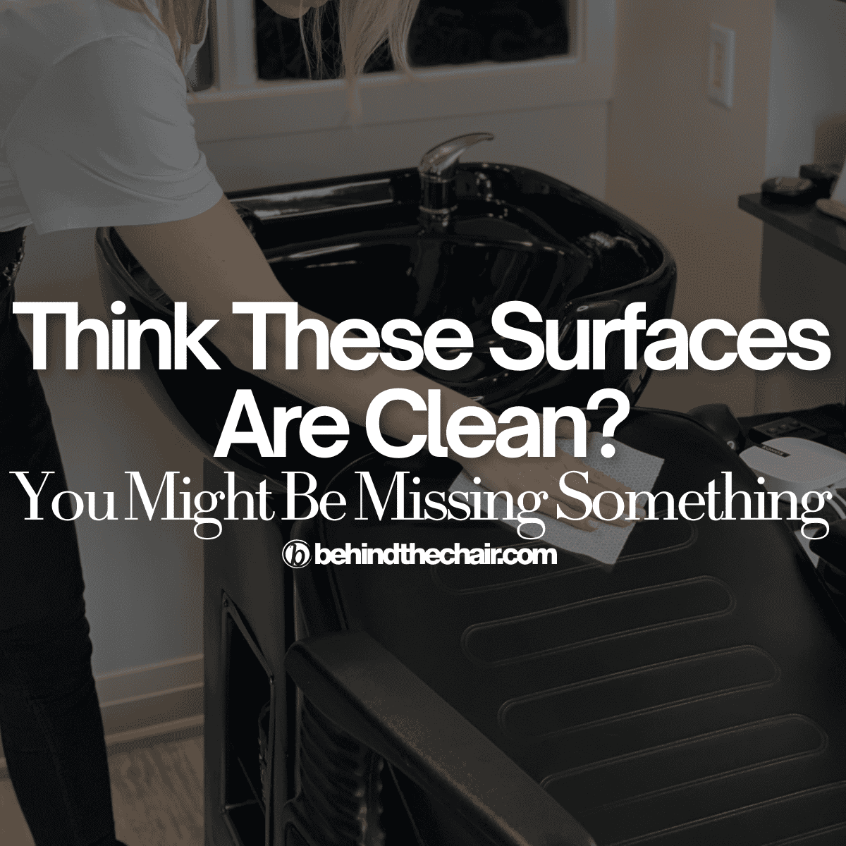 Someone wiping a shampoo chair