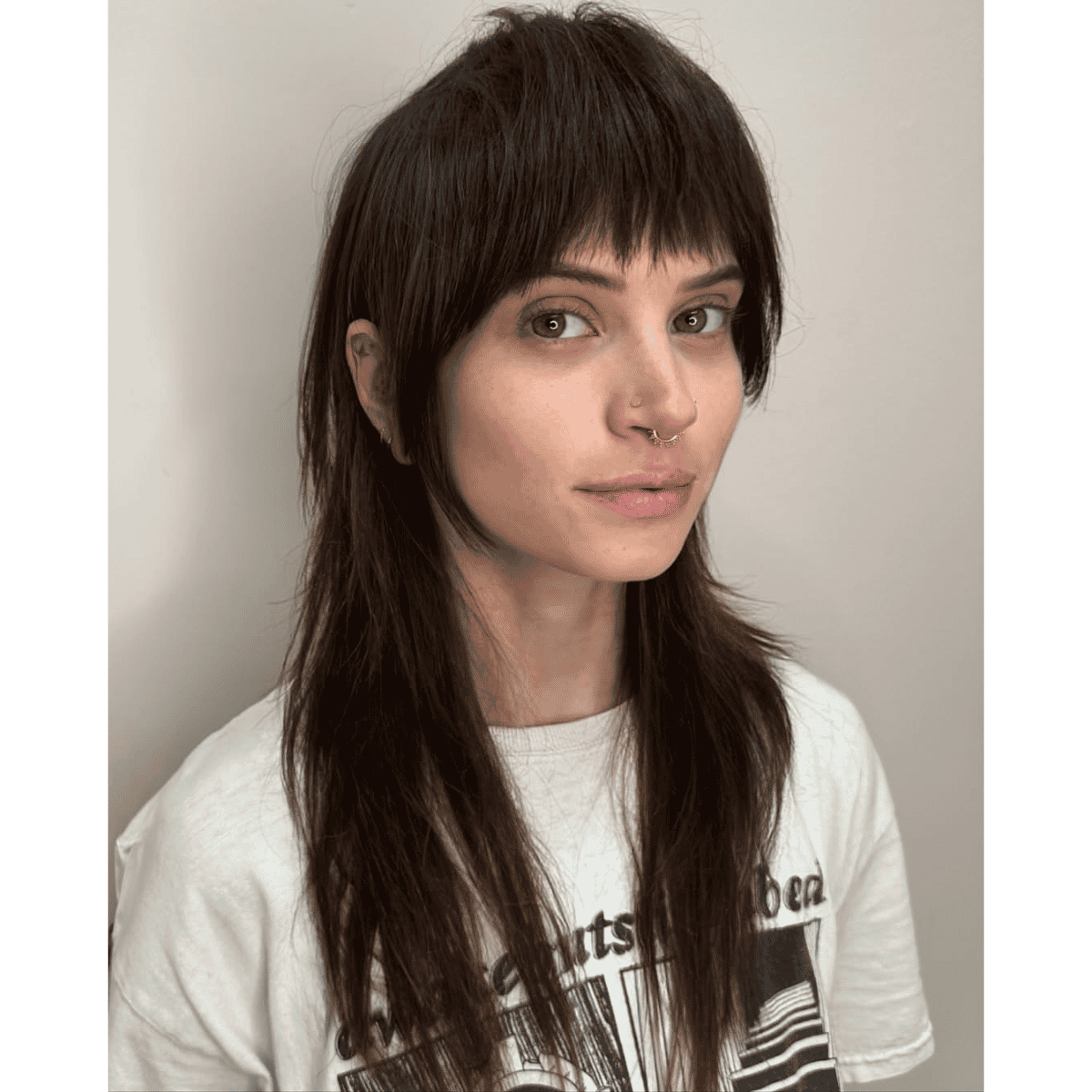 long brunette mullet on a woman