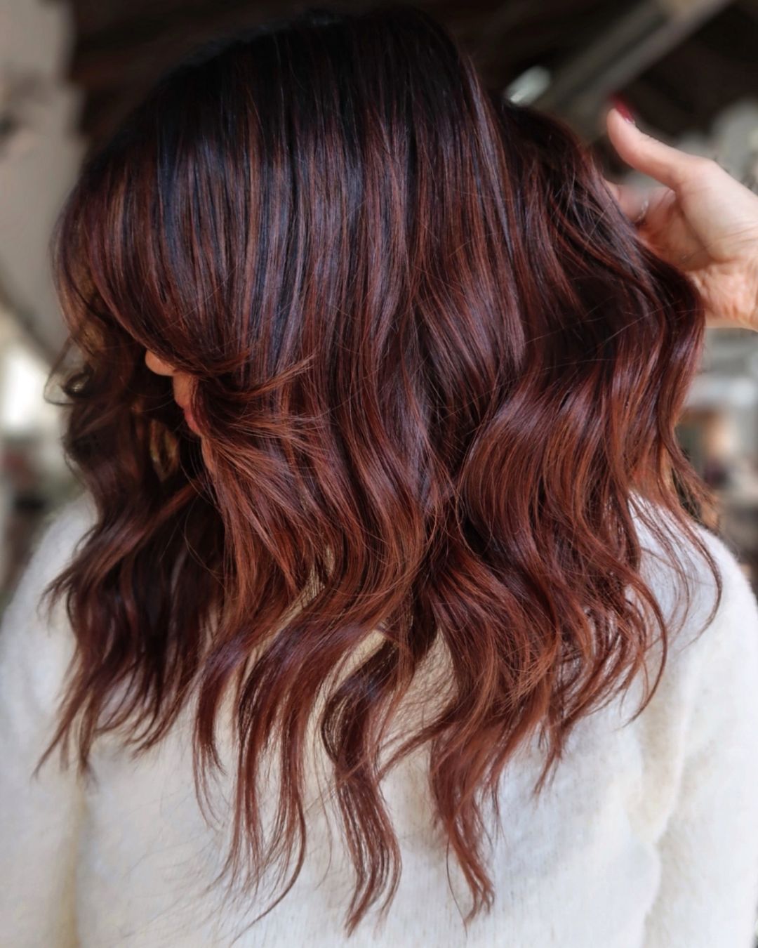 rich dimensional auburn with chocolate Photo Credit Instagram via @larisadoll