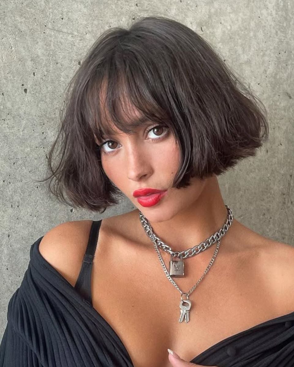 Short airy bob with soft fringe and tousled texture, a key spring/summer haircut trend for effortless movement.