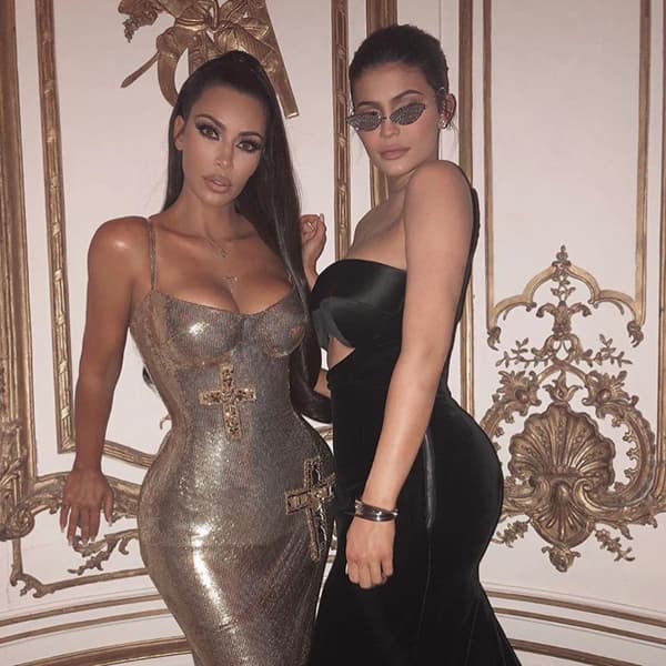 Kim Kardashian West At The Met Gala 2018 Rocking A Half-Up High Ponytail Poses With Sister Kylie Jenner
